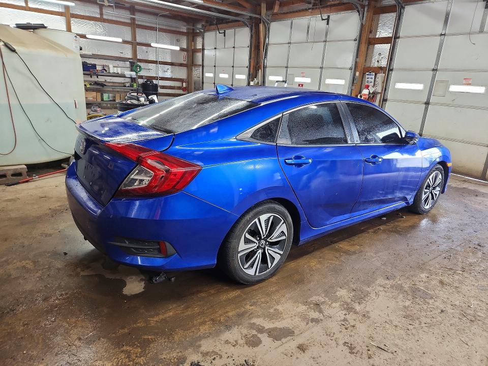 Photo 3 from auction – 2016 HONDA CIVIC with VIN 19XFC1F45GE209429