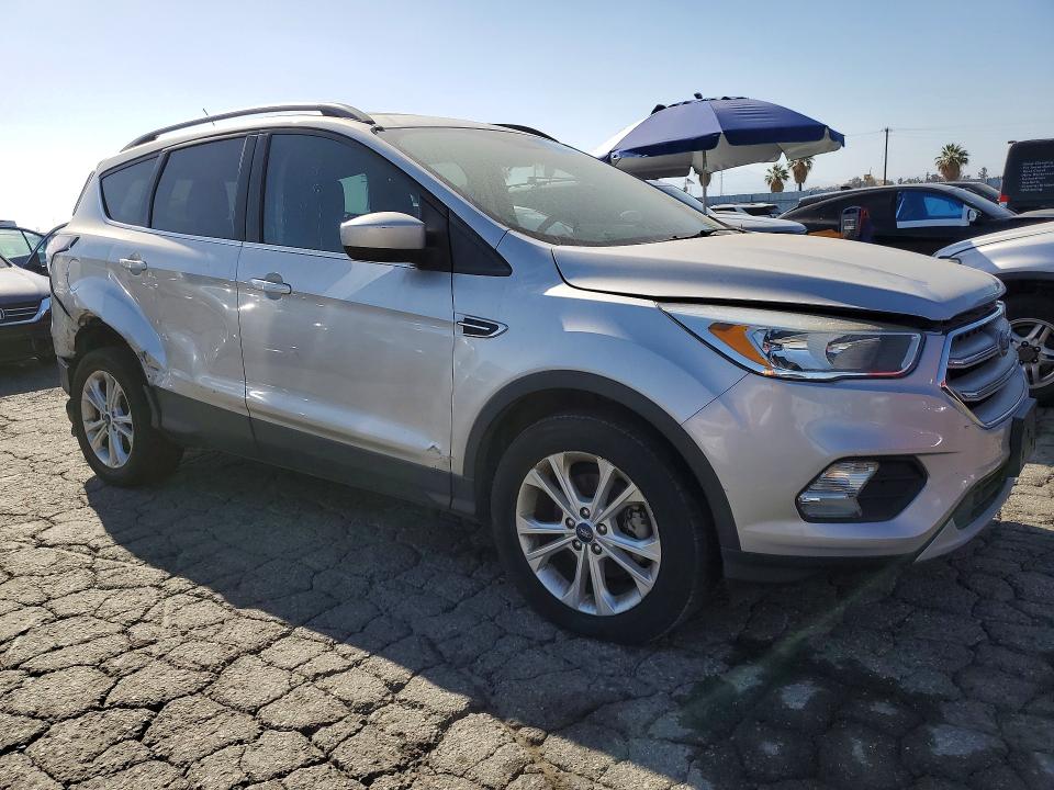 Photo 4 from auction – 2018 FORD ESCAPE with VIN 1FMCU0GD1JUA11458