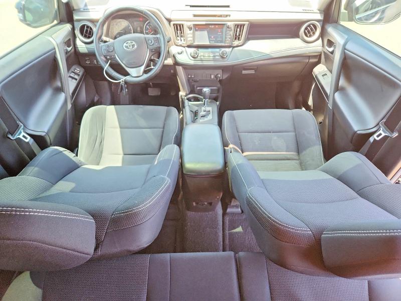 Photo 8 from auction – 2018 TOYOTA RAV4 with VIN 2T3RFREV7JW743623