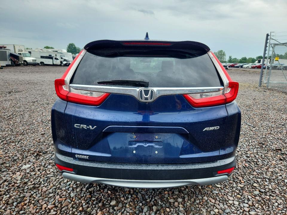 Photo 6 from auction – 2018 HONDA CR-V with VIN 7FARW2H57JE008900