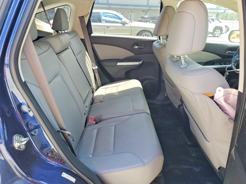 Photo 11 from auction – 2015 HONDA CR-V with VIN 2HKRM3H75FH515134