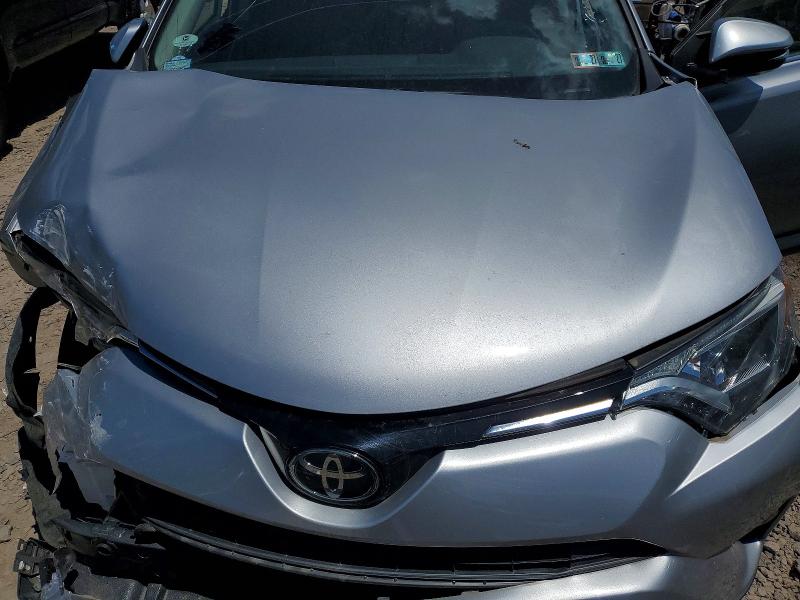Photo 12 from auction – 2018 TOYOTA RAV4 with VIN JTMRFREV2JD254110