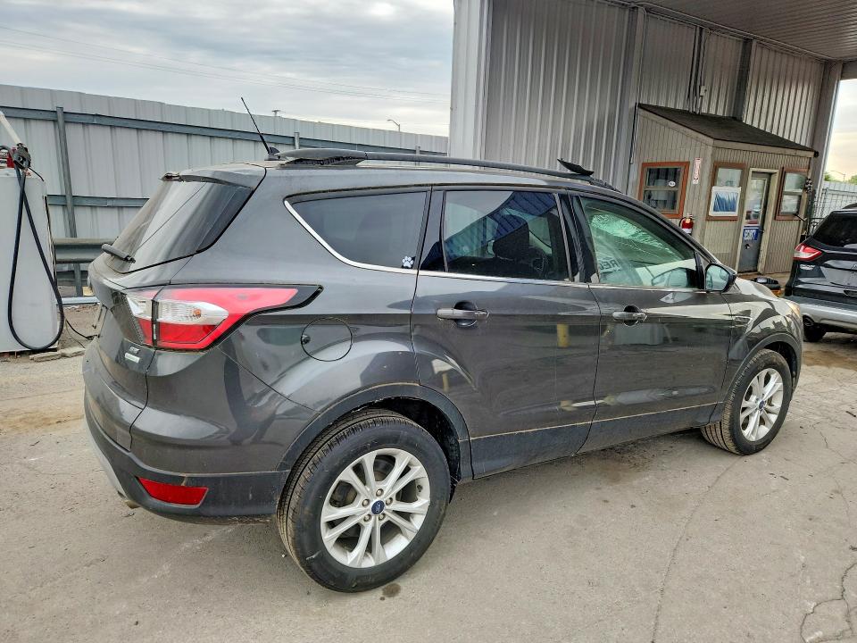 Photo 3 from auction – 2018 FORD ESCAPE with VIN 1FMCU0GD6JUD35702