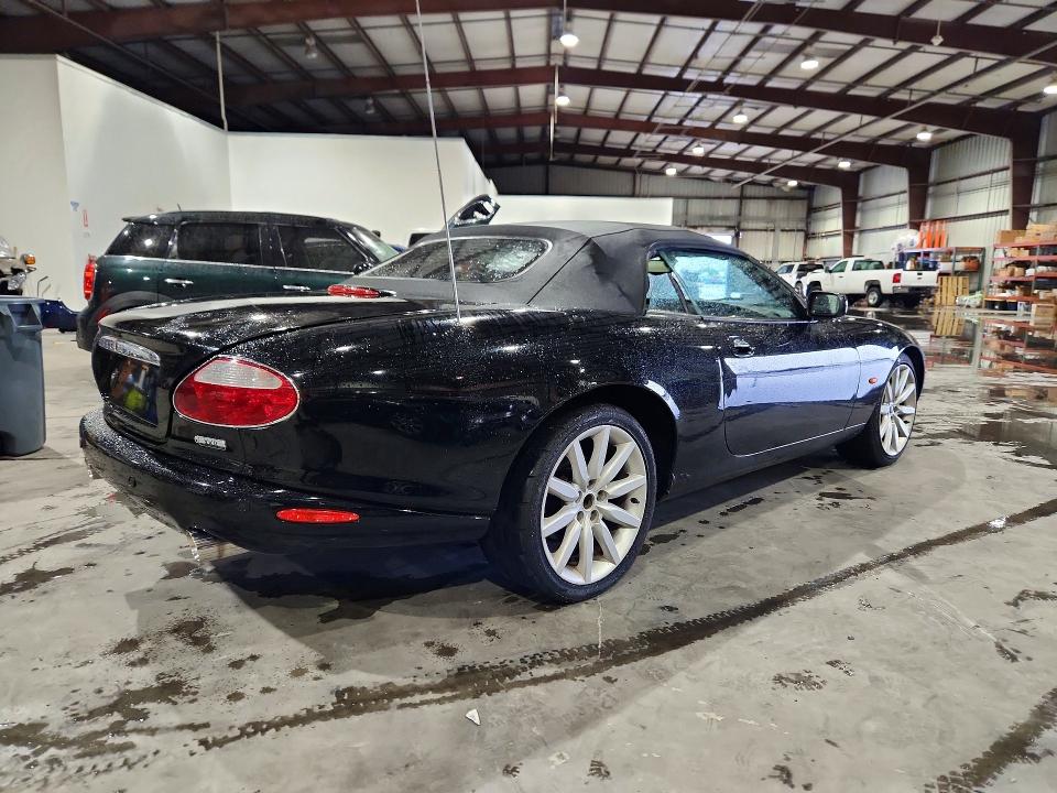 Photo 3 from auction – 2004 JAGUAR XK8 with VIN SAJDA42C142A37702