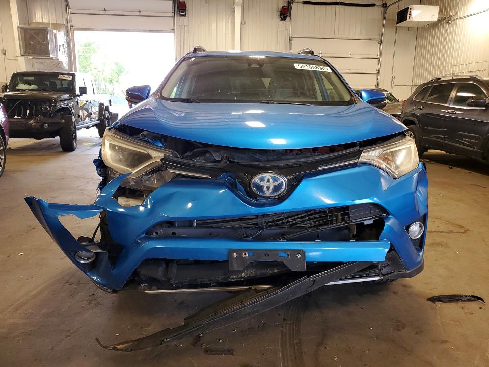 Снимка 5 от търг – 2018 TOYOTA RAV4 HYBRID с VIN JTMRJREV5JD257825