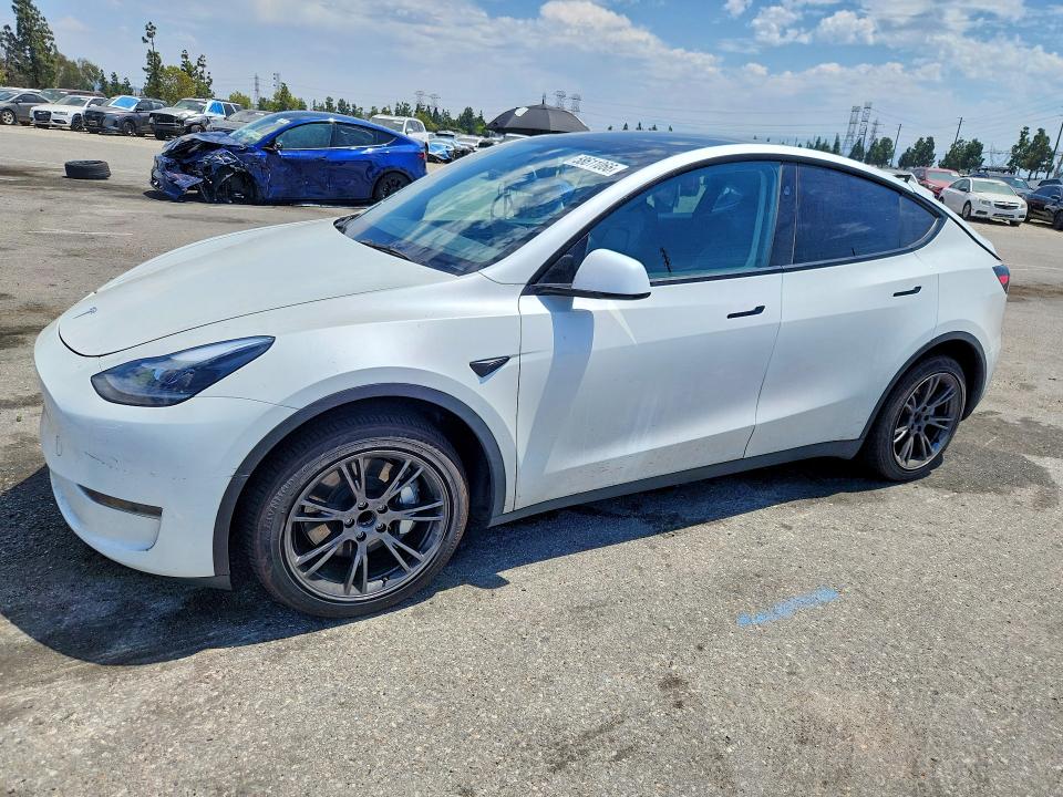 TESLA MODEL Y 2025 with VIN 7SAYGDED6SF272660 - Photo from auction
