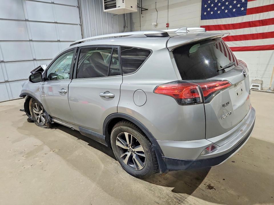 Photo 2 from auction – 2016 TOYOTA RAV4 with VIN 2T3RFREV2GW488484