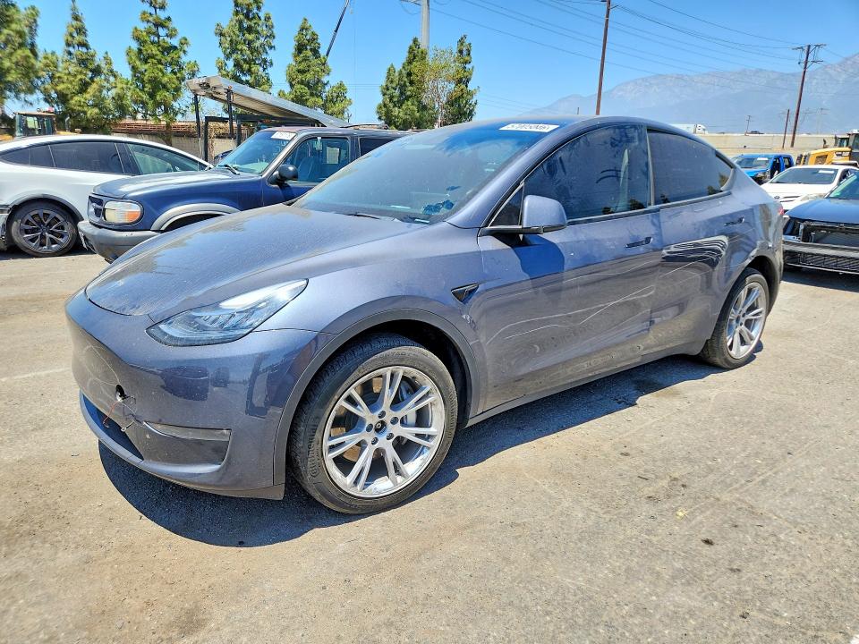 TESLA MODEL Y 2023 with VIN 7SAYGDEE3PA089052 - Photo from auction