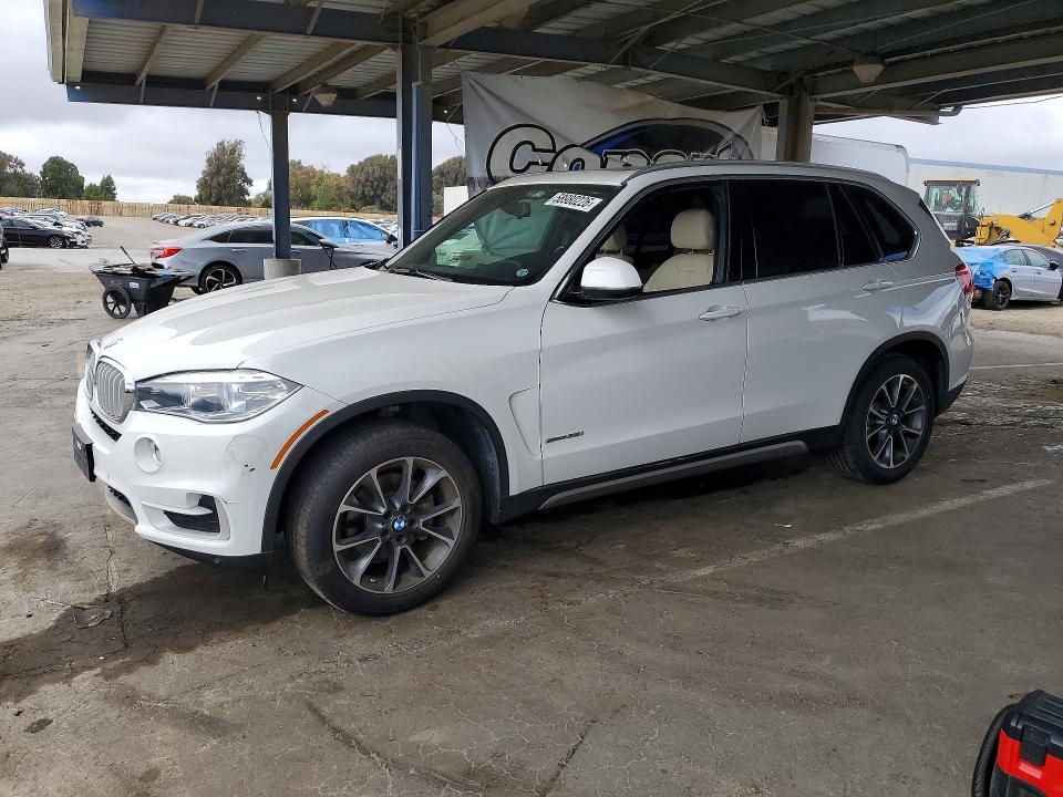 BMW X5 2017 with VIN 5UXKR2C32H0X04646 - Photo from auction