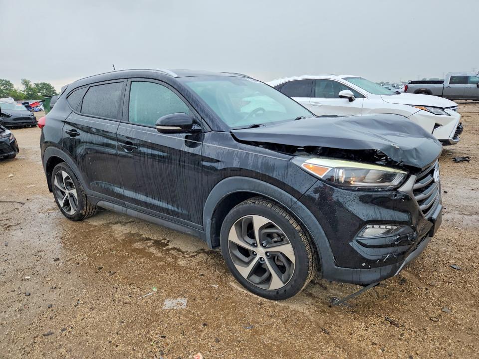 Photo 4 from auction – 2016 HYUNDAI TUCSON with VIN KM8J33A25GU055927