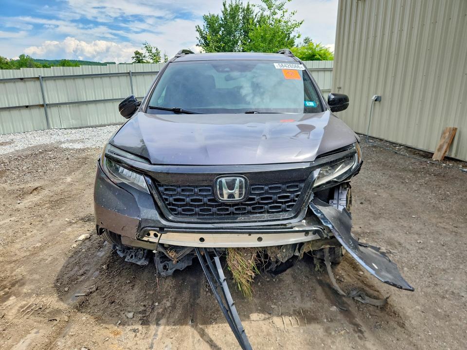 Photo 5 from auction – 2021 HONDA PASSPORT with VIN 5FNYF8H09MB001322