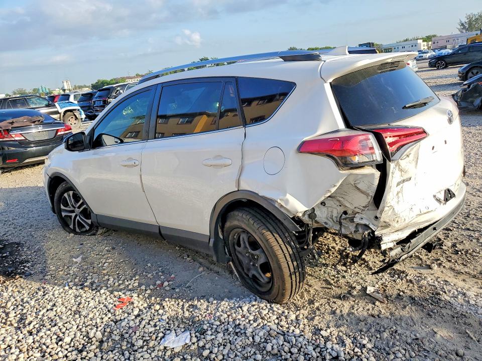 Photo 2 from auction – 2016 TOYOTA RAV4 with VIN JTMZFREV1GD090972