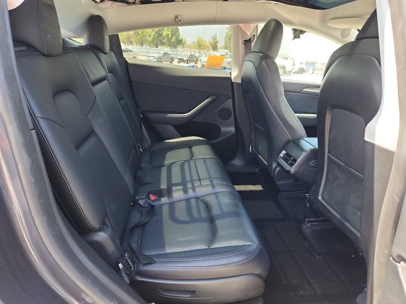 Photo 10 from auction – 2023 TESLA MODEL Y with VIN 7SAYGAEE3PF905534