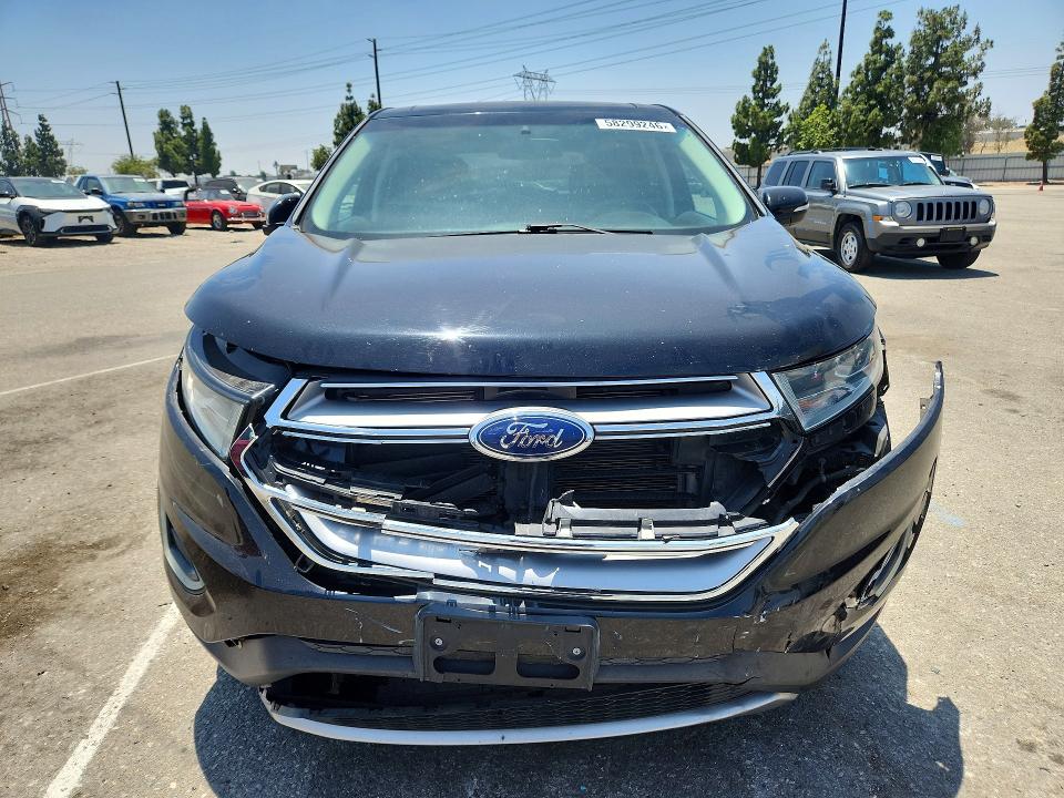 Photo 5 from auction – 2018 FORD EDGE with VIN 2FMPK3K94JBB43373