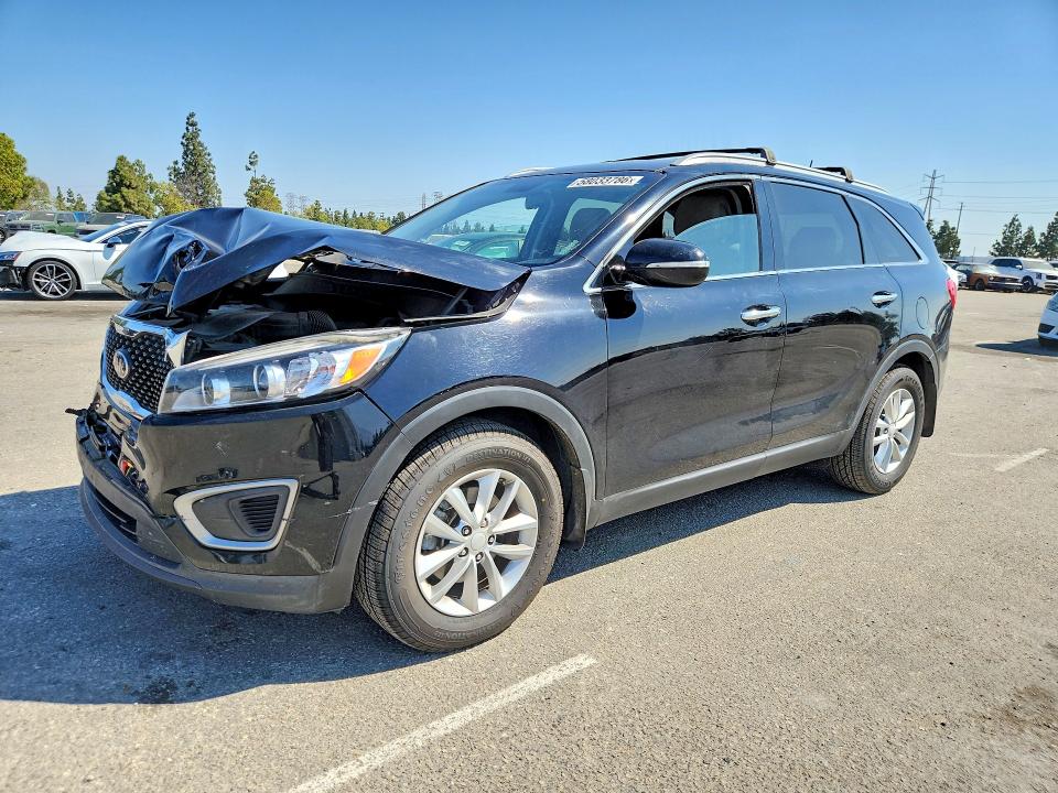 KIA SORENTO 2016 with VIN 5XYPG4A37GG085742 - Photo from auction