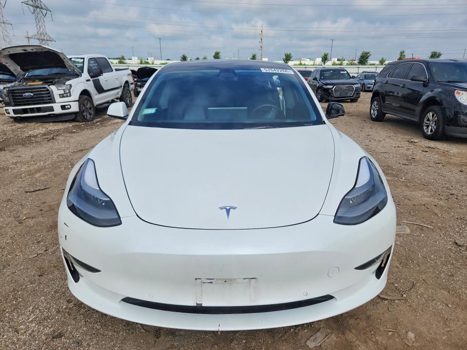 Photo 5 from auction – 2022 TESLA MODEL 3 with VIN 5YJ3E1EB1NF124656
