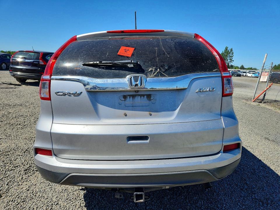 Photo 6 from auction – 2016 HONDA CR-V with VIN 2HKRM4H32GH701993