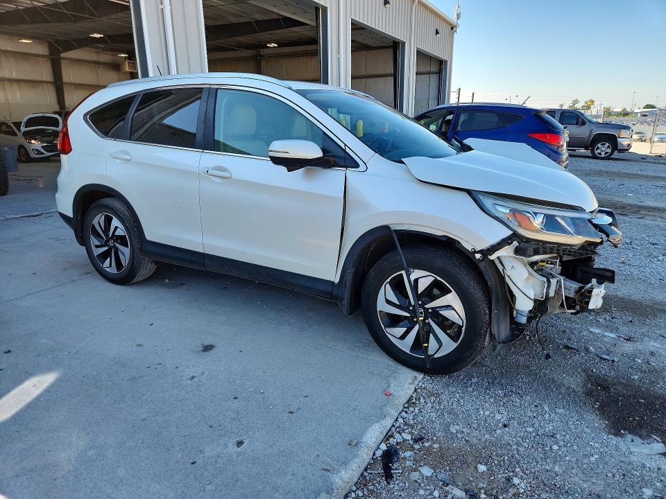 Photo 4 from auction – 2015 HONDA CR-V with VIN 5J6RM4H92FL005143