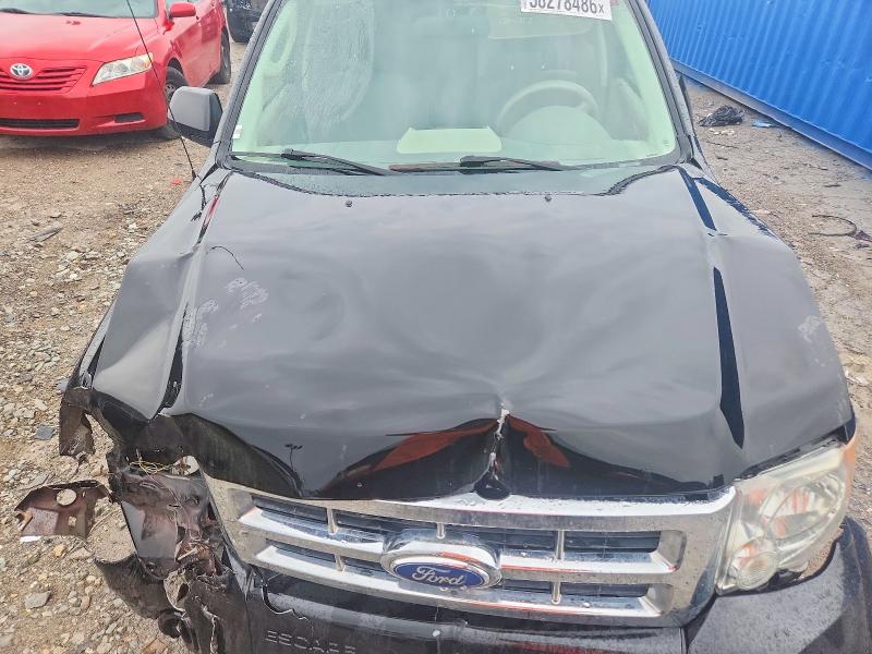 Photo 12 from auction – 2011 FORD ESCAPE with VIN 1FMCU0D79BKB86410