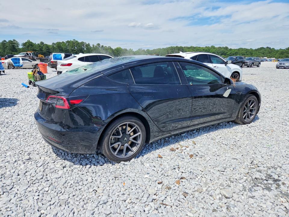 Photo 3 from auction – 2021 TESLA MODEL 3 with VIN 5YJ3E1EA2MF017704