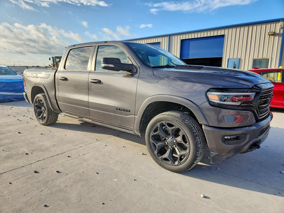 Photo 4 from auction – 2021 RAM 1500 with VIN 1C6SRFHT4MN619619