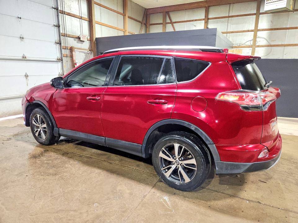 Photo 2 from auction – 2018 TOYOTA RAV4 with VIN 2T3WFREV2JW474918