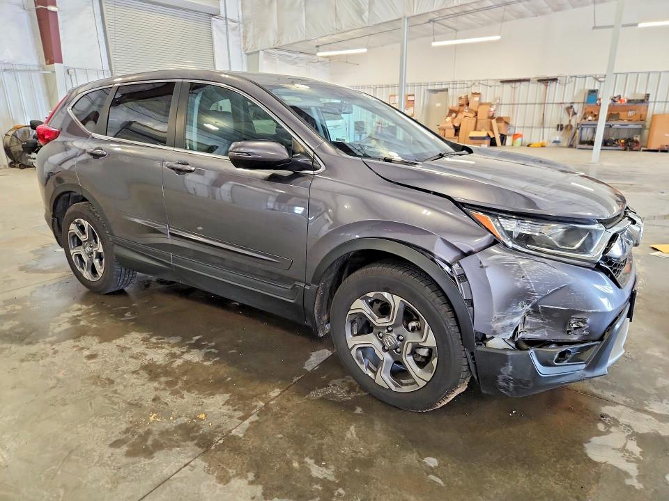 Photo 4 from auction – 2019 HONDA CR-V with VIN 5J6RW2H87KL012654