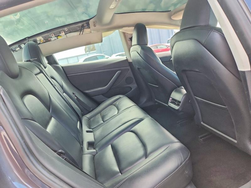 Photo 10 from auction – 2023 TESLA MODEL 3 with VIN 5YJ3E1EA7PF697474