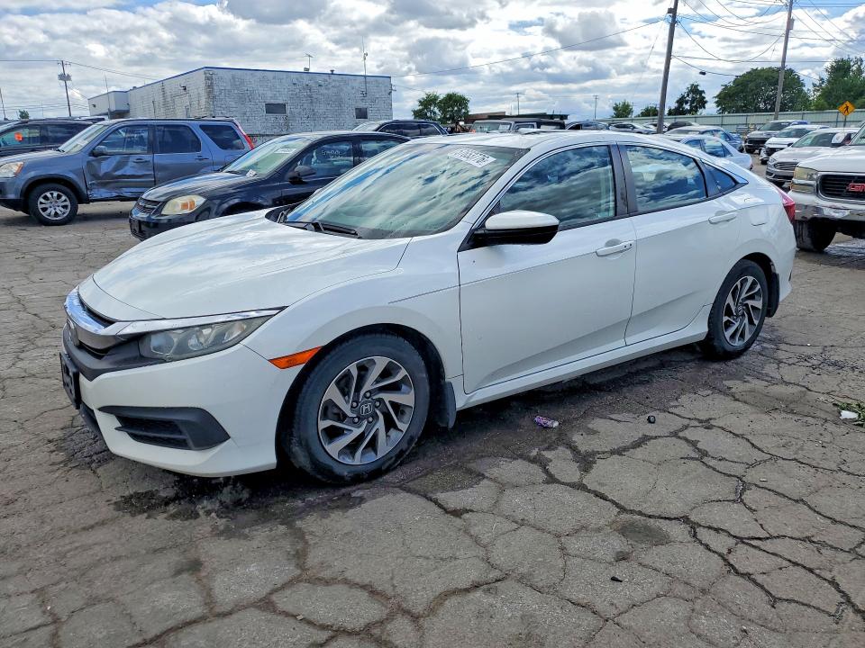 HONDA CIVIC 2018 with VIN 19XFC2F76JE034048 - Photo from auction