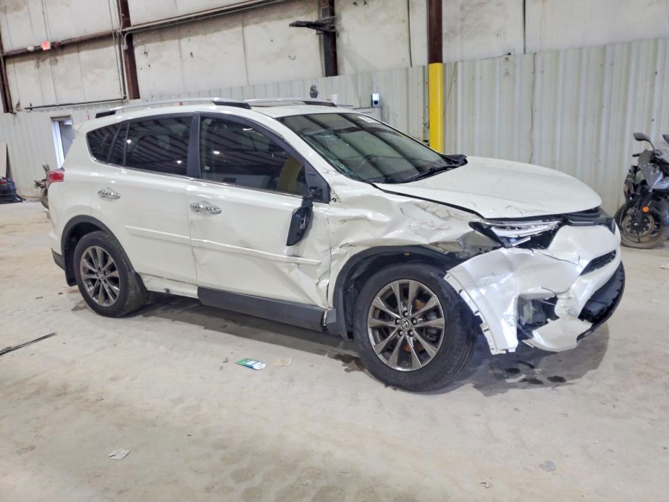 Photo 4 from auction – 2018 TOYOTA RAV4 with VIN JTMDFREV2JJ231406