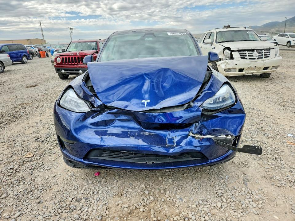 Photo 5 from auction – 2023 TESLA MODEL Y with VIN 7SAYGDED5PF960995
