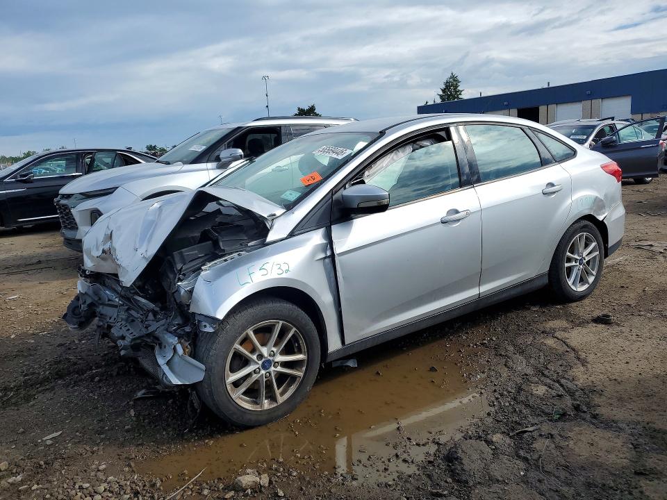 FORD FOCUS 2017 with VIN 1FADP3F24HL225772 - Photo from auction