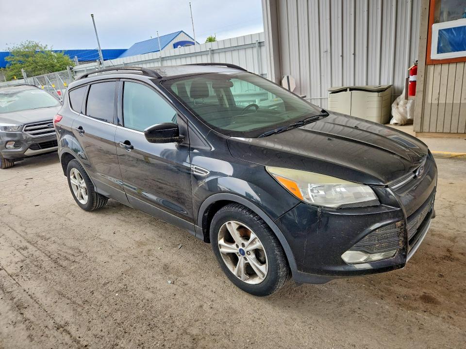 Photo 4 from auction – 2014 FORD ESCAPE with VIN 1FMCU0GX2EUD29928