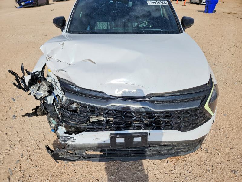 Photo 12 from auction – 2023 KIA SPORTAGE with VIN 5XYK6CAF2PG109673