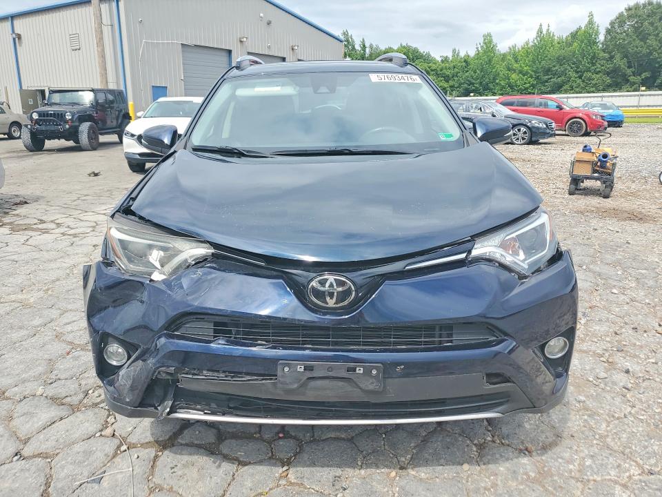 Photo 5 from auction – 2018 TOYOTA RAV4 with VIN JTMRFREV6JD238170