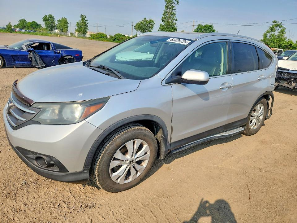 HONDA CR-V 2013 with VIN 2HKRM4H7XDH104590 - Photo from auction