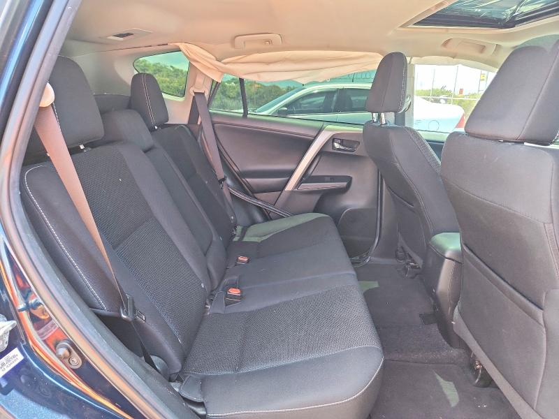 Photo 11 from auction – 2018 TOYOTA RAV4 with VIN 2T3RFREV7JW743623