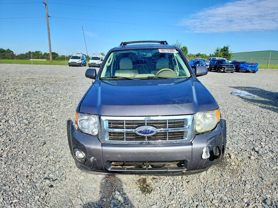 Photo 5 from auction – 2011 FORD ESCAPE with VIN 1FMCU0EG8BKA47349