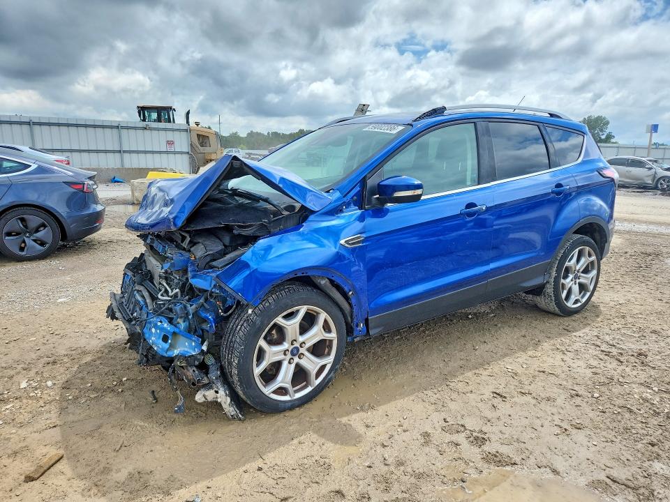FORD ESCAPE 2017 with VIN 1FMCU0J9XHUD51044 - Photo from auction