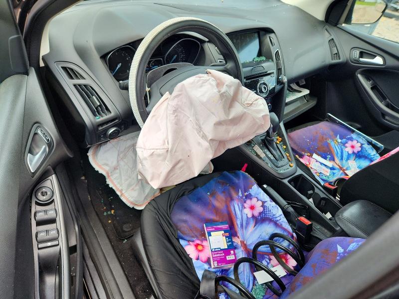 Photo 8 from auction – 2017 FORD FOCUS with VIN 1FADP3H21HL243630
