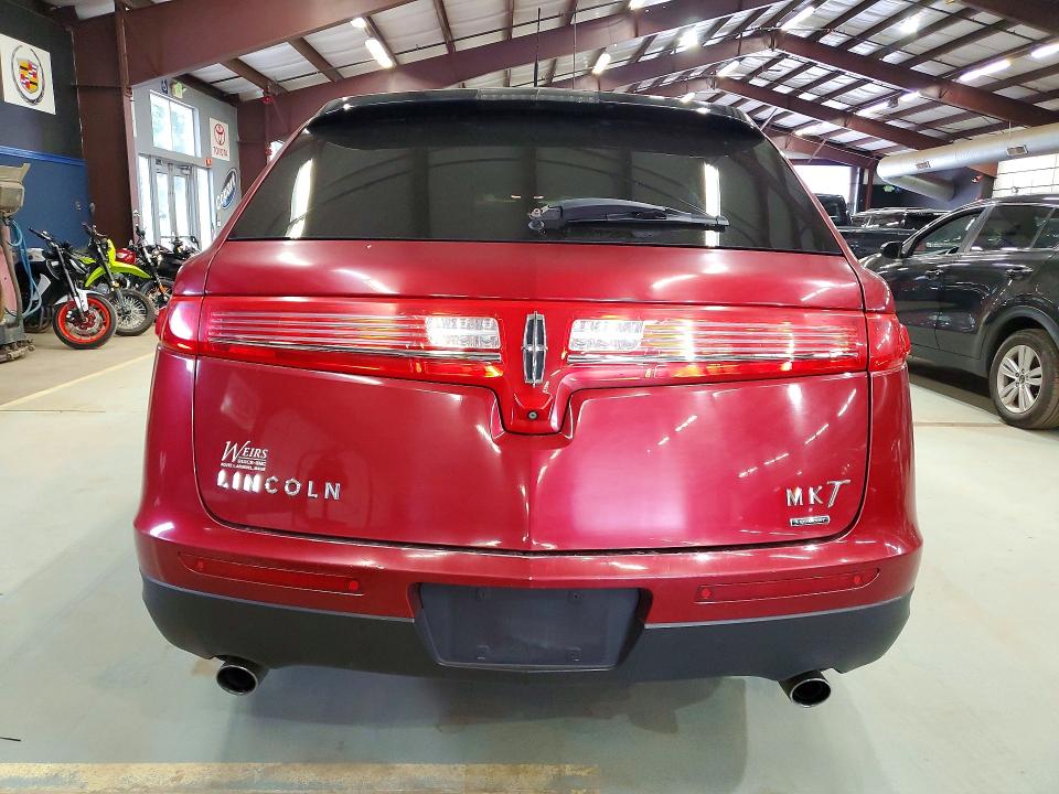 Фото 6 с аукциона – 2016 LINCOLN MKT с VIN 2LMHJ5AT7GBL02674