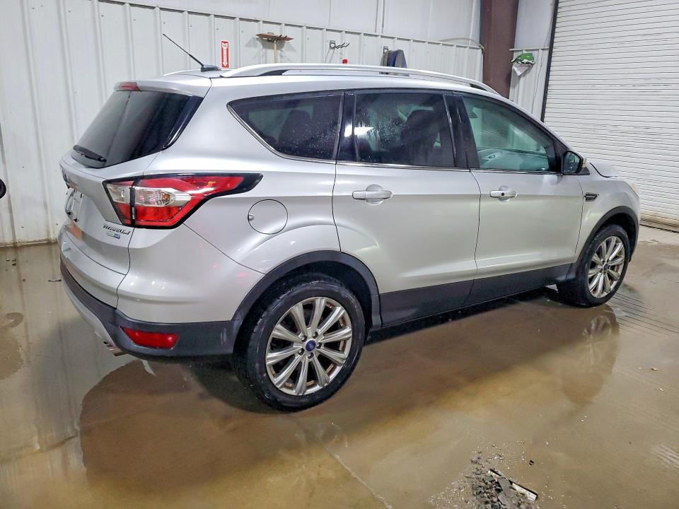Photo 3 from auction – 2017 FORD ESCAPE with VIN 1FMCU9J99HUD96318