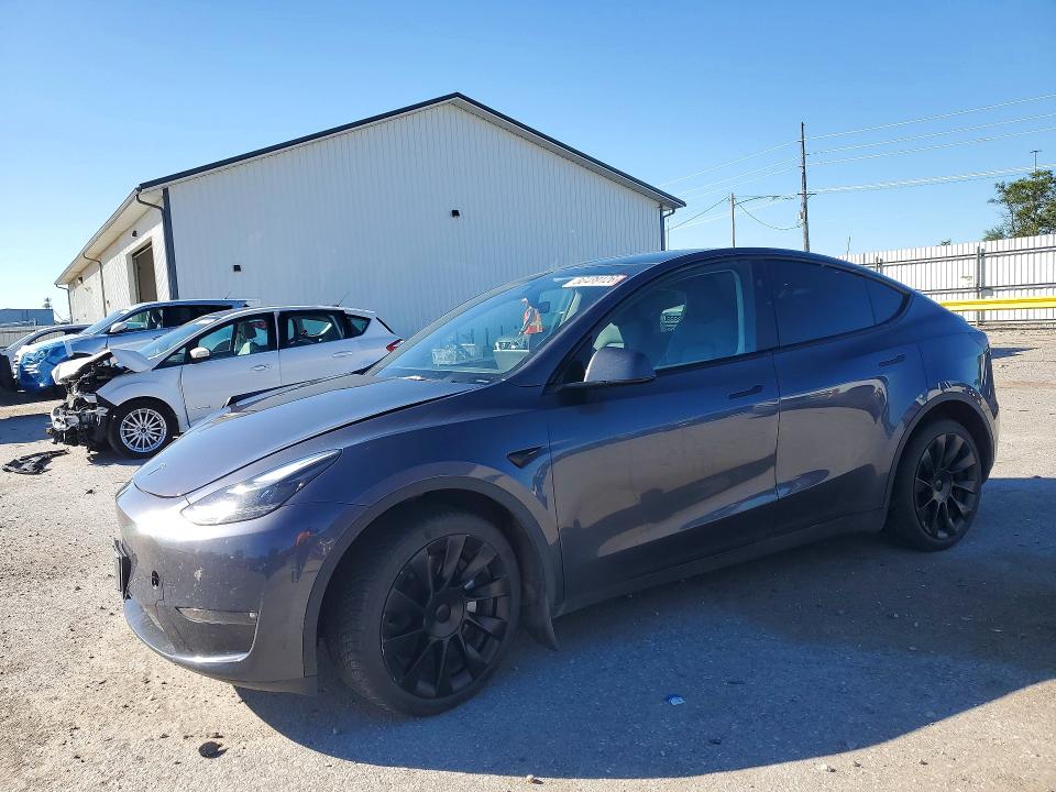 TESLA MODEL Y 2023 with VIN 7SAYGDEE9PF877515 - Photo from auction