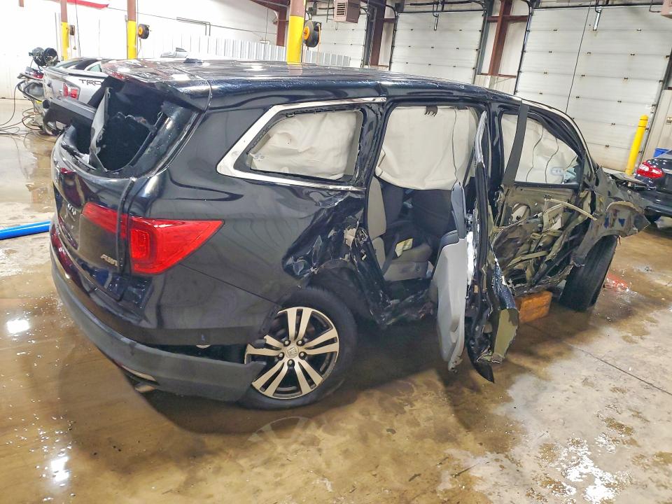 Photo 3 from auction – 2016 HONDA PILOT with VIN 5FNYF6H57GB005745