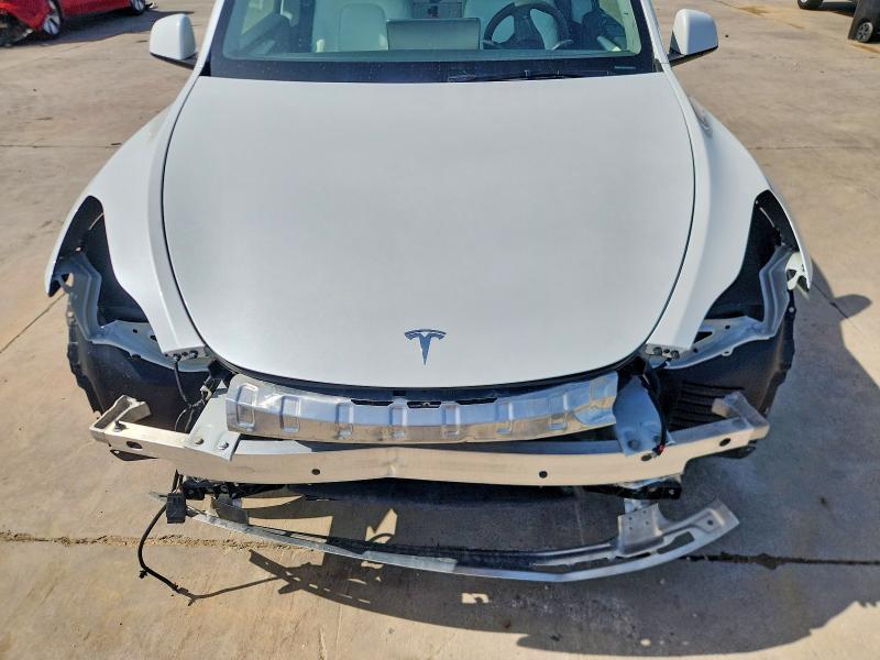 Photo 11 from auction – 2025 TESLA MODEL Y with VIN 7SAYGDEE6SA342230