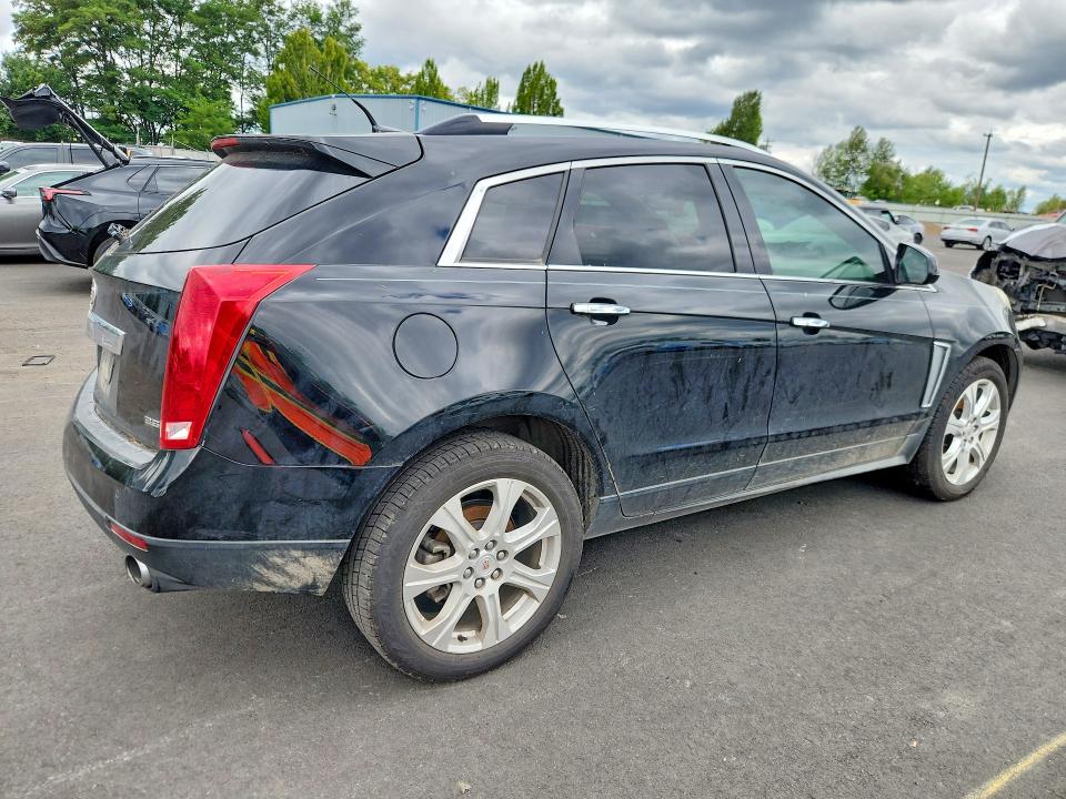 Foto 3 de la subasta – 2013 CADILLAC SRX con VIN 3GYFNDE33DS544555