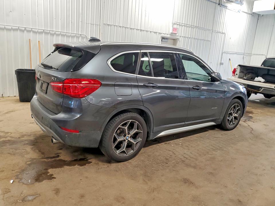 Photo 3 from auction – 2016 BMW X1 with VIN WBXHT3C36G5E53687