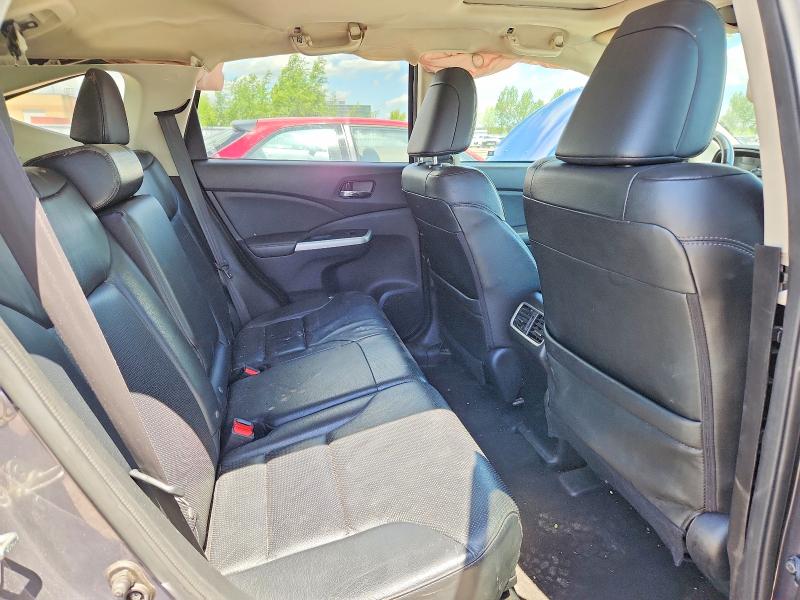 Photo 11 from auction – 2016 HONDA CR-V with VIN 2HKRM4H71GH134291