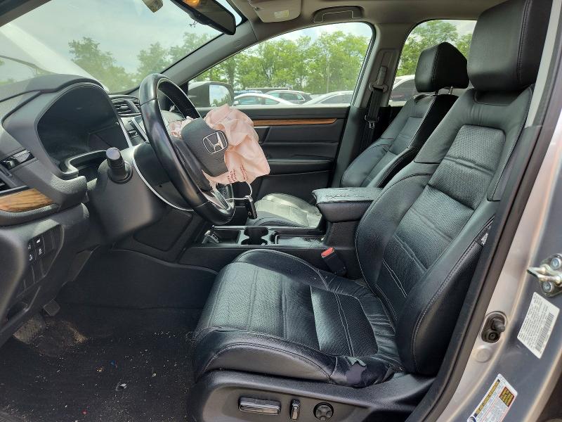 Photo 7 from auction – 2018 HONDA CR-V with VIN 7FARW2H99JE042050