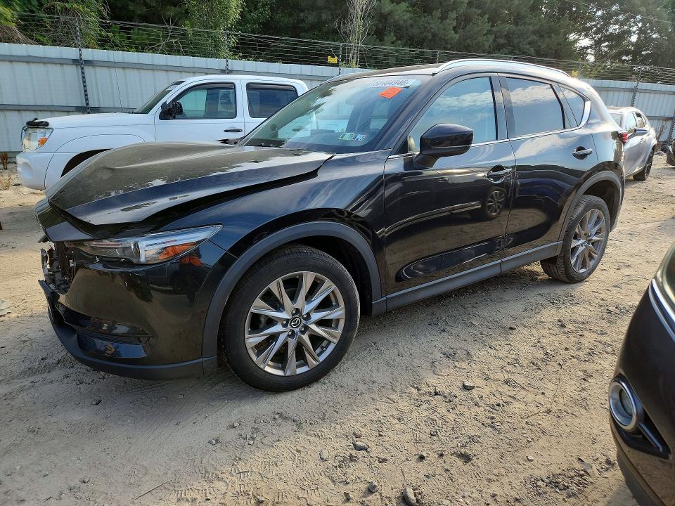 MAZDA CX-5 2021 with VIN JM3KFBDMXM1300491 - Photo from auction